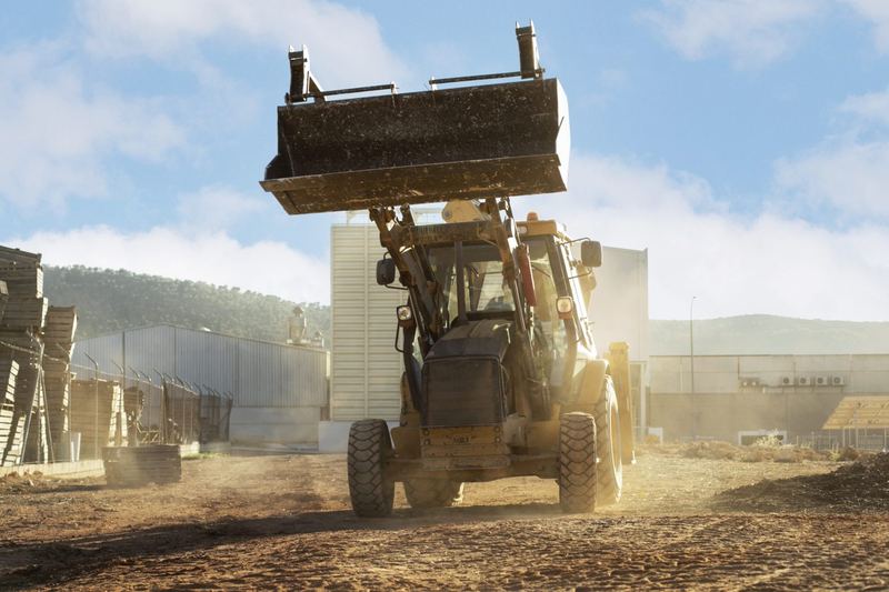 Heavy excavator digging on a mine site